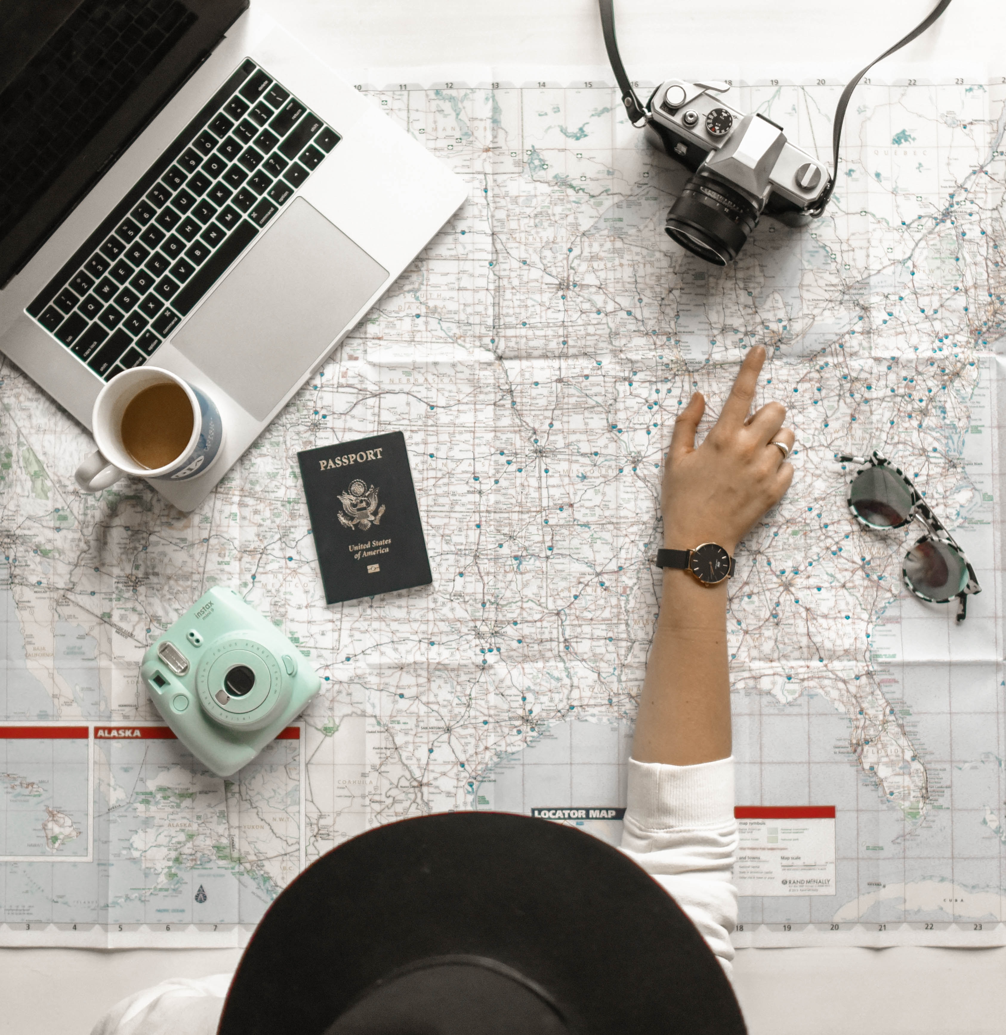 Person looking at a map and passport
